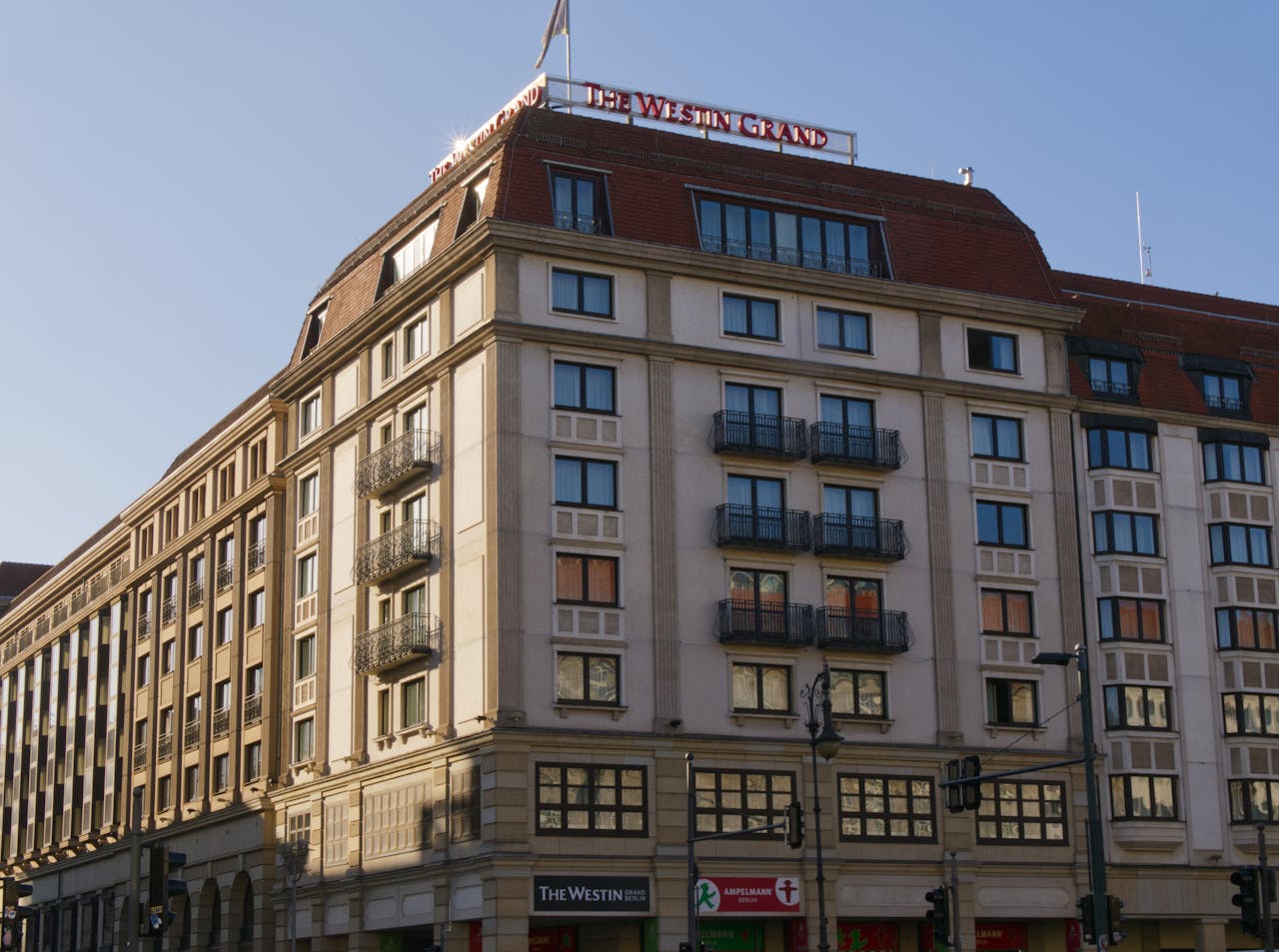 The Westin Grand Hotel facade with a modern architectural design under daylight.